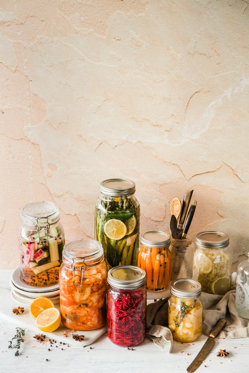 Close-up of fermented vegetables in glass jars for gut health